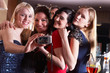 Photo: Young women posing at party Young women posing at party