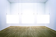 Exhibition room with three pictures on light blue background