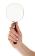 Woman hand with magnifier