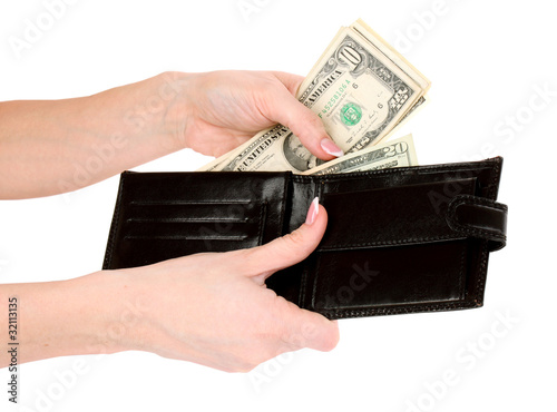 Photo: red purse with dollars in the hands on a white background red purse with dollars in the hands on a white background