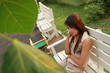 asian girl sitting in chair asian girl sitting in chair