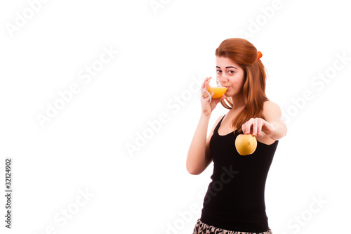 Photo: healthy young girl drinking apple juice healthy young girl drinking apple juice
