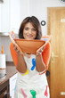 Woman cooking at her kitchen