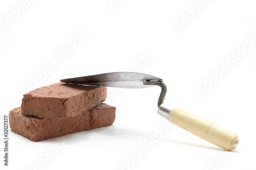 Photo: trowel with red brick trowel with red brick