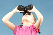little girl with binoculars