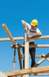 Construction worker on scaffold