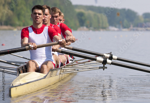 Photo: Rowing team during the start Rowing team during the start