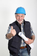 Construction site manager with security helmet Construction site manager with security helmet