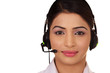Asian CUSTOMER SERVICE AGENT LOOKING TO THE FUTURE