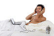Nepalese man in bad, relaxing