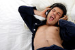 Nepalese man in pajamas, headphones