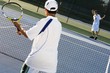 Two Tennis Players Competing