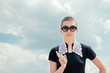 Young woman wearing round glasses Wagging Finger