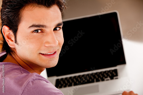 Photo: Man with laptop Man with laptop