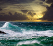 wave during storm in sunset time