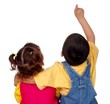 Photo: kids together pointing up kids together pointing up