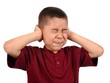 Photo: child protecting ears from loud noise child protecting ears from loud noise