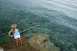 Fishing -  girl fishing at the beach