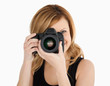 Blond-haired woman taking a photo with a camera Blond-haired woman taking a photo with a camera