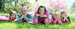 Happy family lying on a blanket