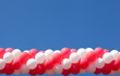 Sheaf of balloons against the sky
