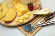 Photo: A set of cheese on a wooden board A set of cheese on a wooden board