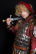 Handsome man holding a sword