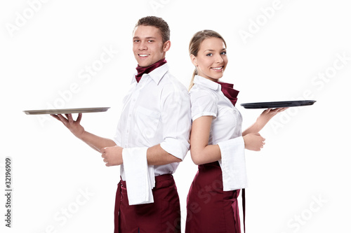 Foto: Two attractive waiters Two attractive waiters