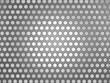 Carbon fiber surface with holes