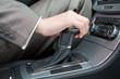Hand of the driver of the car