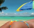Photo: Sexy girl, colurful umbrella on paradise beach. Sexy girl, colurful umbrella on paradise beach.