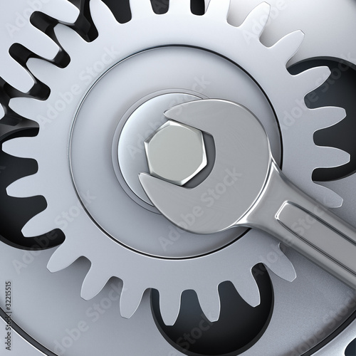 Illustration: Gear wheels and wrench - fixing Gear wheels and wrench - fixing