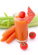 Glass of vegetable juice with umbrella