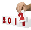 Illustration: GoldHand holds calendar card for change of date GoldHand holds calendar card for change of date
