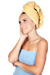 Pensive girl with towel Pensive girl with towel