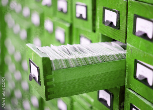 Photo: card catalog or cabinet with opened drawer and files card catalog or cabinet with opened drawer and files