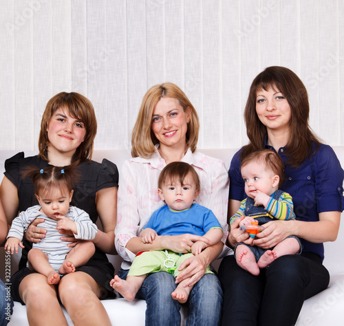 Photo: Women sitting with babies Women sitting with babies