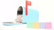 Cute baby kitten taking a nap inside of blue mailbox