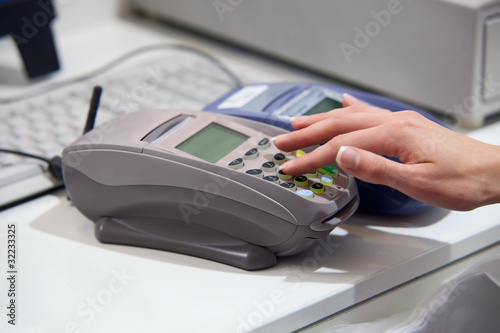 Photo: Paying with credit card through terminal Paying with credit card through terminal