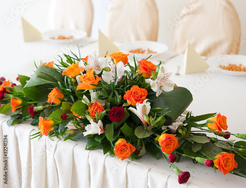 Photo: Wedding flower composition - orange roses Wedding flower composition - orange roses