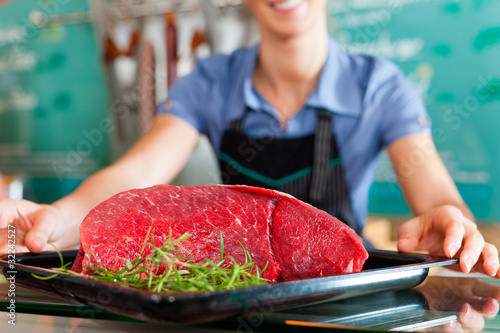 Photo: Working in a butcher's shop Working in a butcher's shop