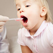 Child taking a medicine