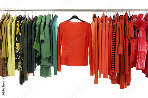 Photo: fashion colorful clothing hanging a on display fashion colorful clothing hanging a on display