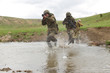 Soldiers running across the water Soldiers running across the water