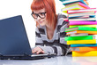 teenager girl with laptop and books
