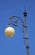 old streetlight with blue sky