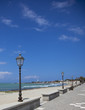a empty boulevard with blue sky