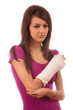 young girl with broken hand in pain
