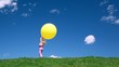 girl stands with yellow bubble on green grass meadow girl stands with yellow bubble on green grass meadow