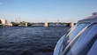 boat floats on river channel to St. Petersburg in evening
